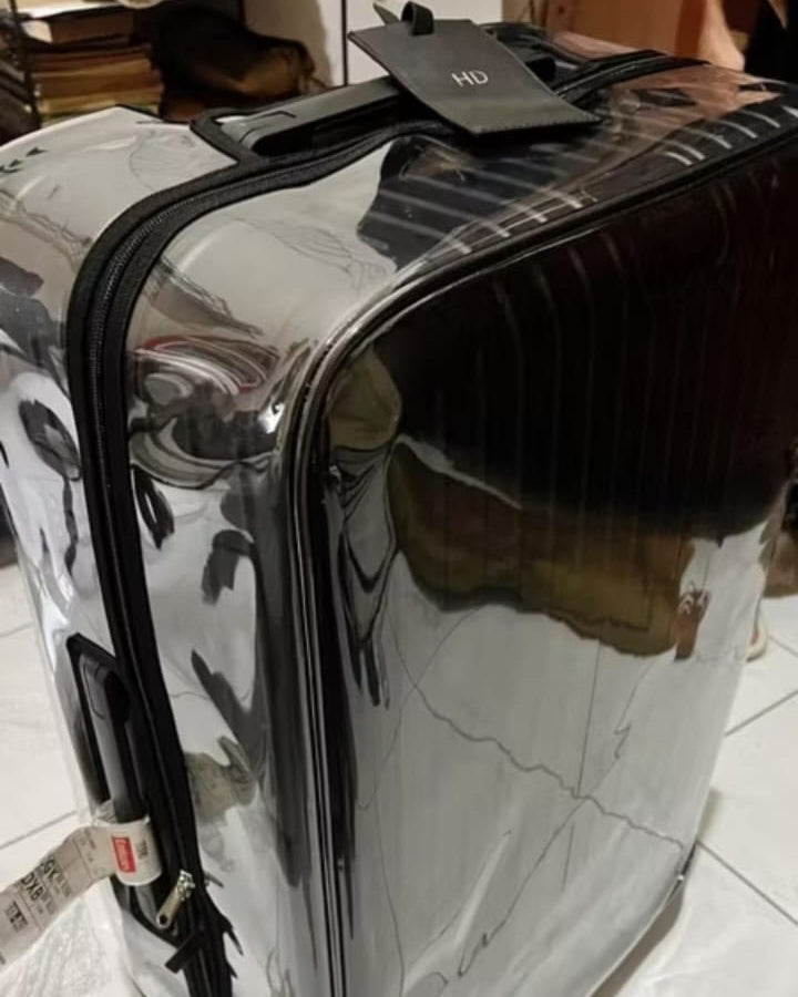 Rimowa aluminum suitcase vs Calpak polycarbonate — which needs a luggage cover more