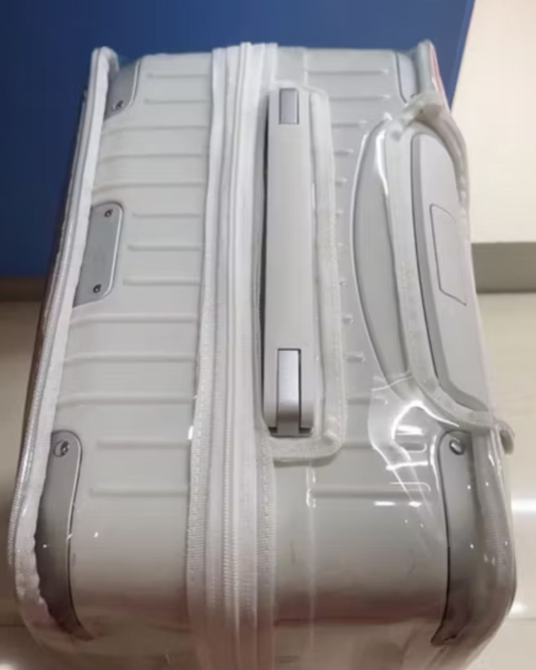 Rimowa custom-fit cover vs generic luggage cover comparison — fit, material, zipper, and protection by Fixmeuniva