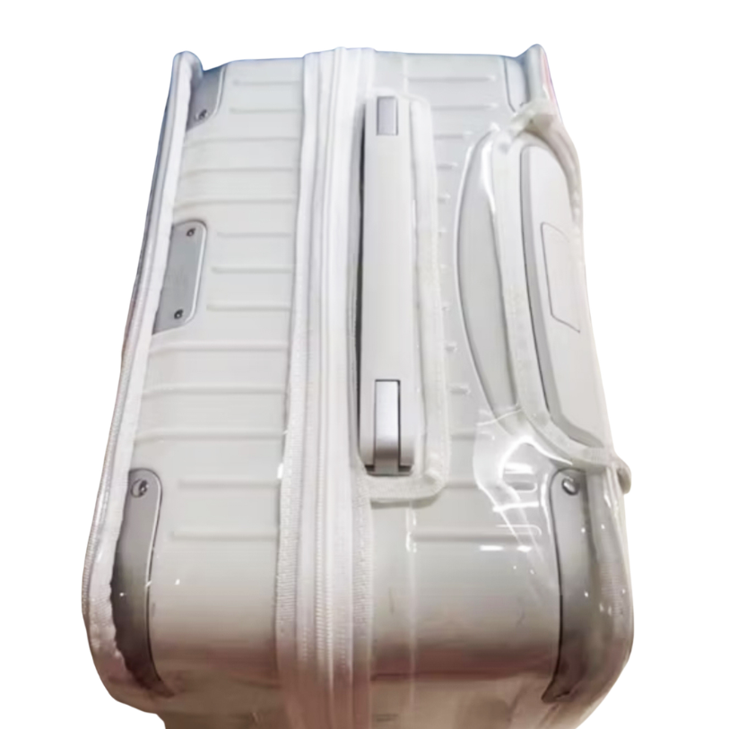Top view of a Rimowa Hybrid Check-In M with a clear Fixmeuniva cover, showing the top handle opening and zipper.